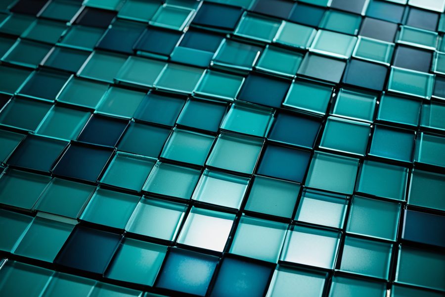 Rows of translucent glass tiles lit from below in teal, illustrating a credit portfolio for IFRS 9 ECL implementation